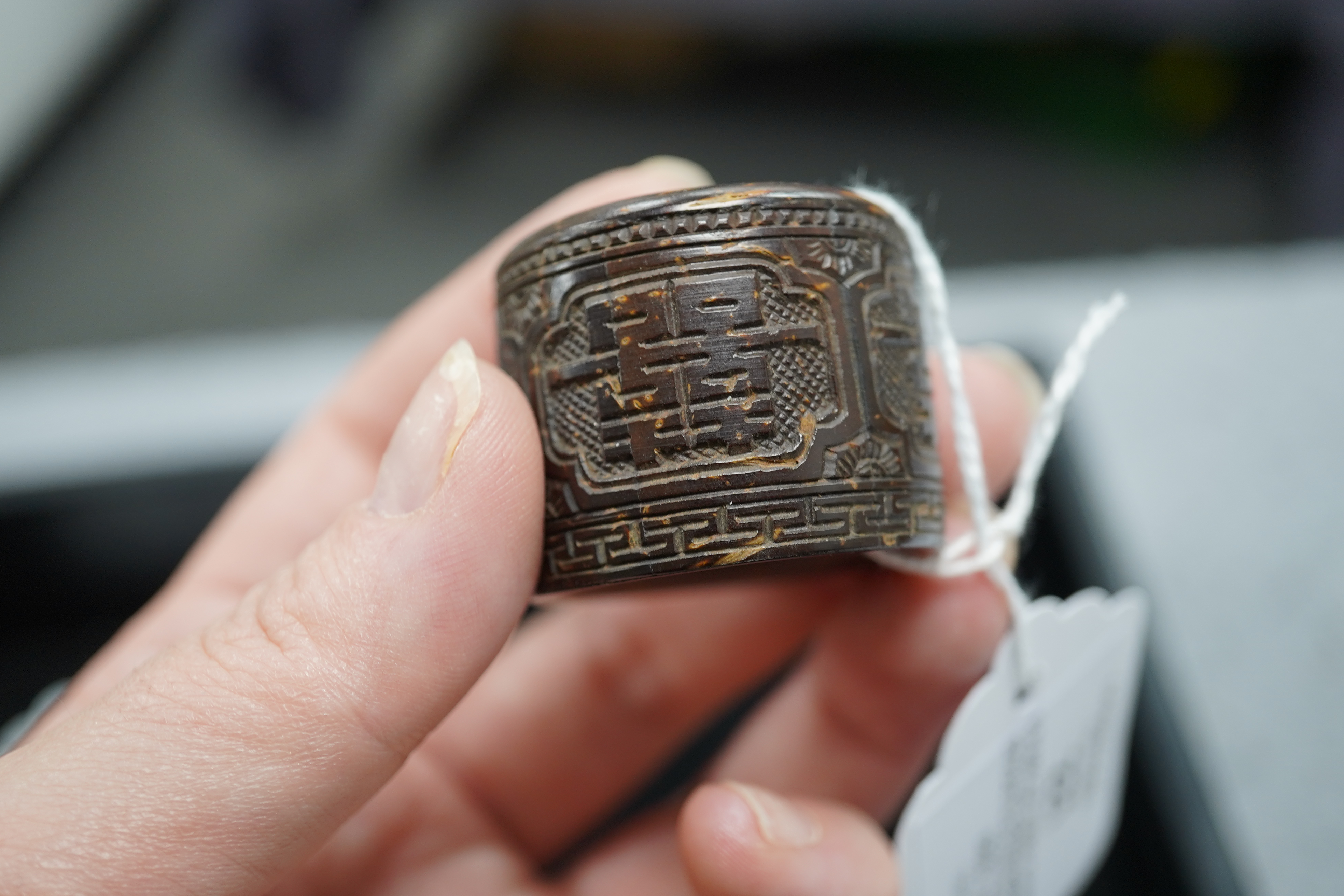 A pair of rare Chinese Straits palm wood archer's thumb rings, 19th century